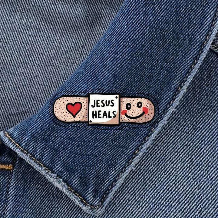 Christianartworkshop "Jesus ​​Heals" Acrylic Heart Band-Aid Brooch: A Symbol of Faith and Comfort - Jesus ​​Heals - image 1