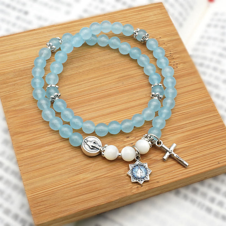 Christianartworkshop 6mm Light Blue Bead Miraculous Medal & Crucifix Minimalist Bracelet: A Symbol of Faith - image 1