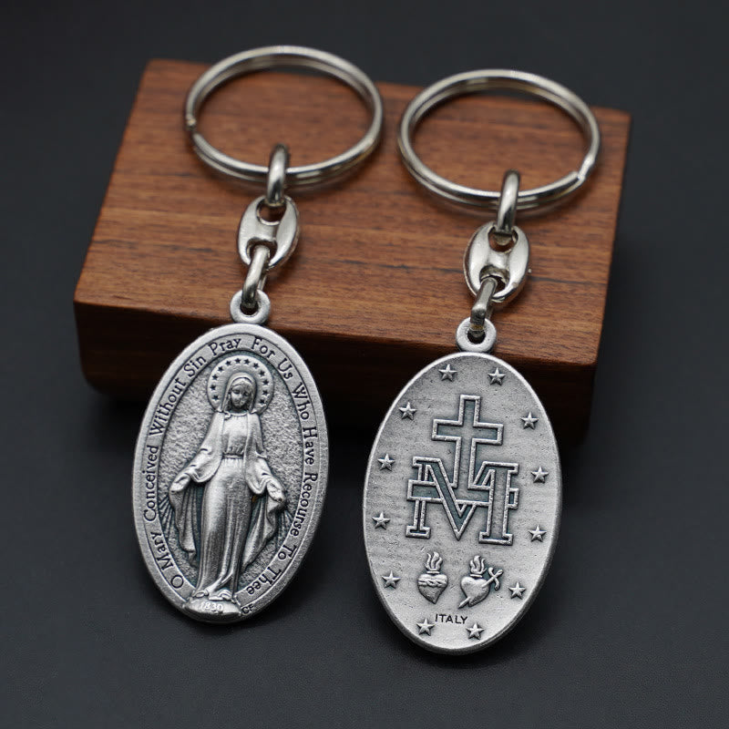 Christianartworkshop Classic Hand-Carved Mary Miraculous Medal Keychain: Graceful Sign of Devotional Faith - English - image 1