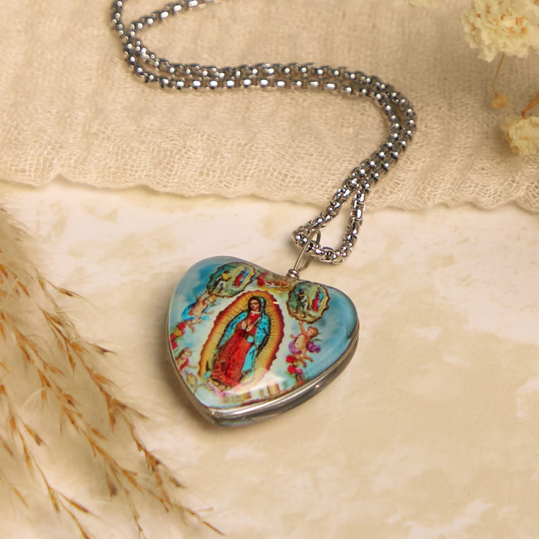 Christianartworkshop Blue Our Lady of Guadalupe Glow-in-the-Dark Heart Shaped Resin Medal Necklace - Holy Mary - image 1
